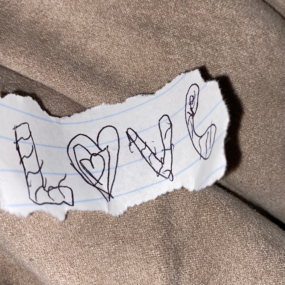 Love paper with goods in package